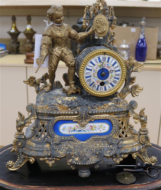 A 19th century French gilt metal and Sevres style porcelain mounted eight day mantel timepiece, height 43cm, with glass dome